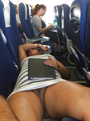 candid upskirt no panties airplane - In a short dress and showing her pussy inside an airplane - Sexy Candid  Girls