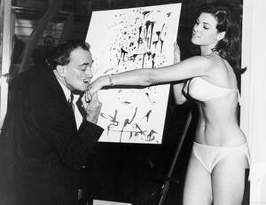 Fucking Raquel Welch Porn - Salvador DalÃ­ kisses 25-year-old Raquel Welch's hand in front of his  abstract portrait of her, 1965. [1300x1003] : r/HistoryPorn