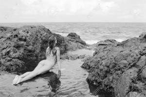 black and white pictures of people on the beach nude - Sexy nude Caucasian woman doing yoga pose in tidal pool on beach in Maui,  Hawaii