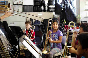 Girls Brass Trombone Porn - Esmeralda Martinez, center, demonstrates good trombone posture. Her  practice room is an office