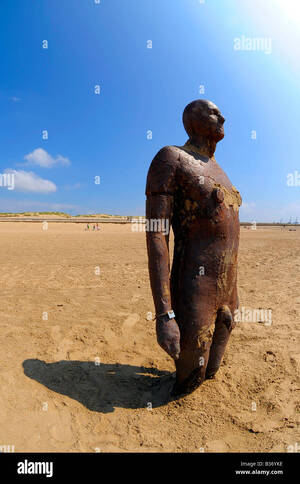 mud beach nude - wideangle nude naked another place iron man anthony gormley crosby beach  liverpool travel tourism art sculpture summer seaside Stock Photo - Alamy