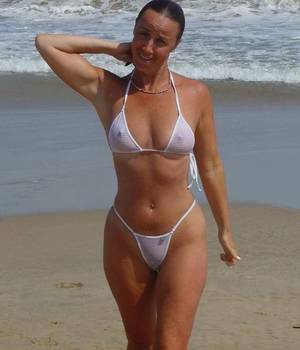 amateur milf bikini beach - Brunette Amateur Milf in a sheer white Bikini