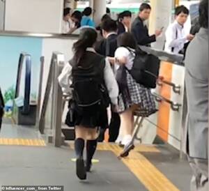 japanese chikan molester train deposit files - Japanese schoolgirls chase down a 'chikan' - men who grope women on trains  - on a station platform | Daily Mail Online