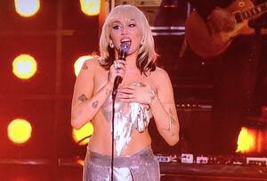 Miley Cyrus Nasty Porn - Miley Cyrus Has Accidental Nipple Slip During NBC's New Year's Eve Special