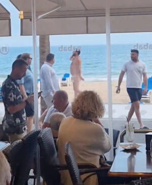 naked beach stripping - Bizarre moment man strolls totally naked through crowded Benidorm beach  leaving tourists stunned | The US Sun