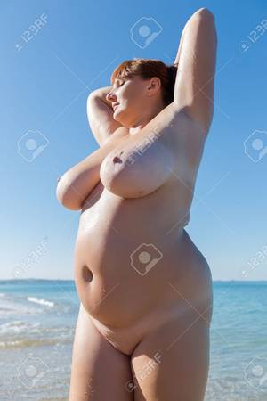 fat middle aged nudes - Overweight middle aged woman at the sea. Nude overweight middle-aged woman  posing with