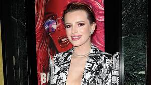 Bella Thorne Porn In S - Bella Thorne Wore a Suit Covered in Porn to the 'Babysitter' Premiere |  Glamour