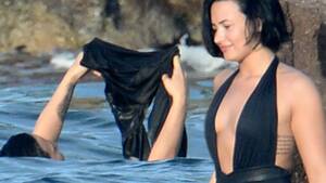 Cartoon Porn Demi Lovato - Demi Lovato strips naked in sea before flashing costume at boyfriend Wilmer  Valderrama - Mirror Online