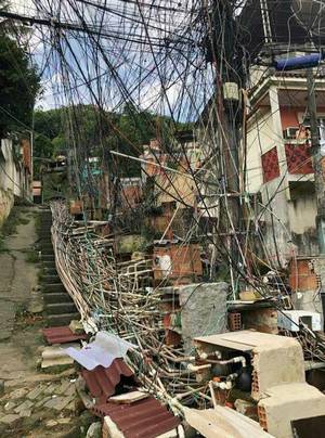 Brazilian Favela Porn - Electrical wiring and water pipes in a brazilian favela ...