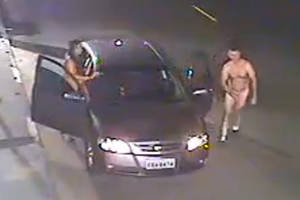 chinese couple is caught - The naked couple dash out of the car for a quickie