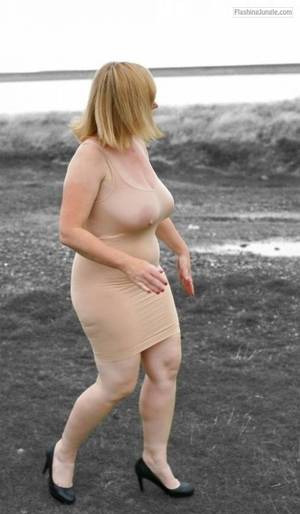 mature big saggy tits in see through - Mature woman in tight see through dress