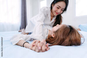 asian girl forced lesbian sex - Same sex asian lesbian couple lover erotic scene in the bedroom happiness  feeling, LGBT sexuality female on bed living together at home. Stock Photo  | Adobe Stock