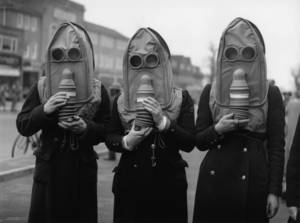 Gas Masked Women Sex For Sleep - Air raid wardens demonstrate a gas mask designed for the elderly and those  with chest complaints