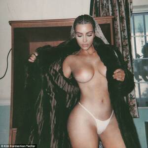 Kim Kardashian Tits Porn - Topless Kim Kardashian holds open coat to expose breasts | Daily Mail Online