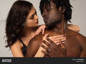 interracial couple hugging - Passionate Interracial Image & Photo (Free Trial) | Bigstock