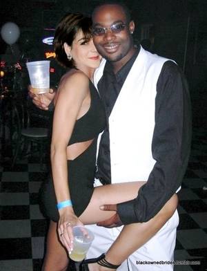 interracial mating - White women with black men flirting, drinking and dancing -- all part of the