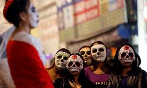 Day Of The Dead Sex - Women wear skeleton masks during a procession organized by sex workers to  remember their deceased colleagues