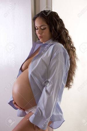 latinas sexy pregnat nude - Pregnancy 3 Weeks Before Childbirth. Seminude Ethnic Hispanic Latina Woman  With Long Hair Standing By Door Stock Photo, Picture and Royalty Free  Image. Image 6784905.