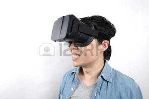 Chinese Boy Porn - Asian man use VR glasses watching video photo