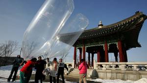 Korean Public Porn - South Korean activists release balloons carrying anti-North Korea leaflets,  in January 2010. Recently, the balloon campaigns have turned raunchy.