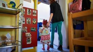 German Toddler Porn - A Kindergarten teacher accompanies a student, who celebrates her third  birthday, in a Kindergarten in Pfungstadt, Germany. Thomas Lohnes / Getty