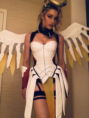 Amber Heard Sexy - Amber Heard Spent Two Months Designing Overwatch Mercy Cosplay For Ex Elon  Musk] | IconEra