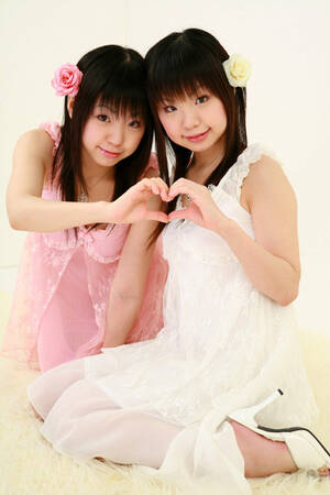 Asian Twins Airi - Lovely Asian twins love change images and take part in explicit photo  sessions. Airi, Meiri. Picture 1.