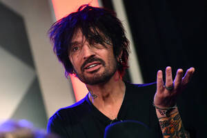 big boob nudist - Tommy Lee Trashes Fan Who Complained About Nudity at Motley Show