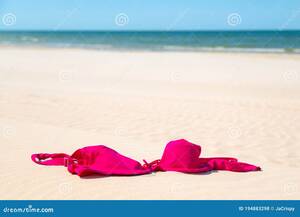 close up beach nudes - Close Up of Woman Bra at Nude Beach. Concept of Sunbathing Naked on the  Sandy Ocean Beach. Naturalist Lifestyle Stock Photo - Image of feminine,  love: 194883298