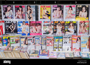 Hong Kong Porn Magazine - Asian adult mens magazines at a street kiosk in Hong Kong Stock Photo -  Alamy