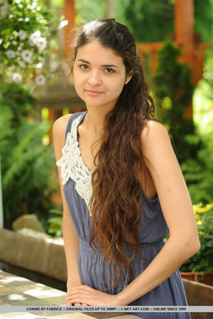 cute and pretty face - Connie portrays a sweet and cute garden nymph with her long, wavy brown  hair, naturally beautiful face without any hint of makeup, and an exquisite  body ...