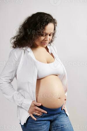 6 months pregnant nude - Beautiful curly haired multi ethnic pregnant woman with naked belly,  isolated on background. Pregnancy 6 month. 24 weeks 23730040 Stock Photo at  Vecteezy