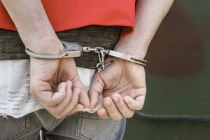 handcuffed - Help When Charged with Downloading Child Pornography - Capetillo Law Firm