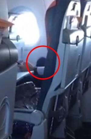 flight - Shocking moment randy plane passenger watches porn and starts pleasuring  himself on board busy plane | The Irish Sun