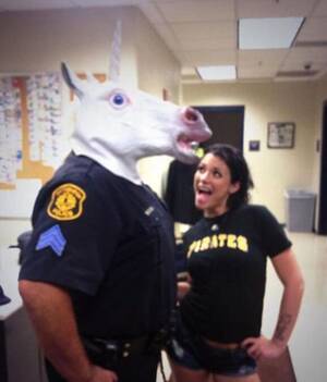 Cop Porn Star - Instagram photo of a porn star, a unicorn head and a cop lands officer in  hot water