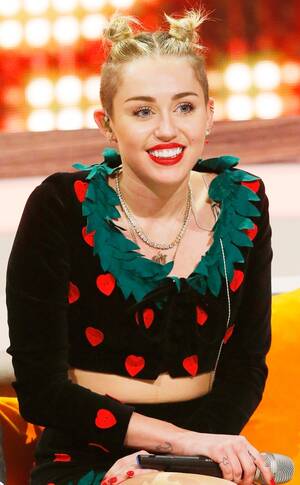 20 Years Old Miley Cyrus Porn - Miley Visits German TV Show, Tweets Naked Selfie