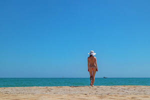 close up beach nudes - Young Girl On Nude Beach In Spain Photograph by Cavan Images - Pixels