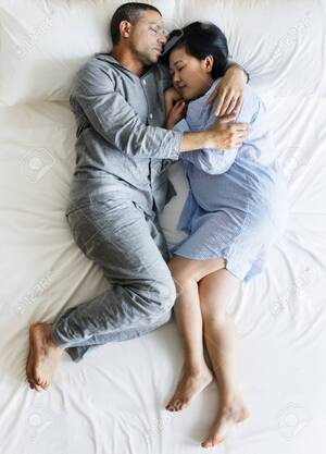 interracial couples sleeping - Interracial Couple Sleeping Together On The Bed Stock Photo, Picture and  Royalty Free Image. Image 95112787.