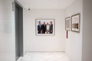 Ayagi Azeri - A portrait of the Trump family hanging near an elevator in Trump Tower in  Manhattan. Credit Todd Heisler/The New York Times