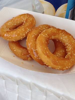 Cambodian Yum Yum Porn - Doughnuts sold at a Cambodian Buddhist temple in Hampton, MN. It is made  with rice flour , fried , and topped with caramelized sugar and sesame  seeds.