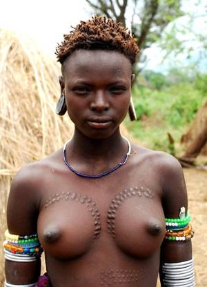 giant natural tits african tribe - Girl from a Umm Bororo tribe. They are nomads with cattles,by origin from