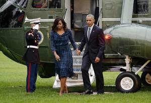 Michelle Obama Fat Ass Porn - Barack and Michelle Obama arrive back at the White House last night after a  day on the hustings. (Olivier Douliery/EPA)