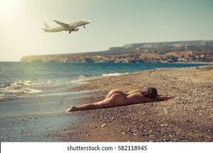 laying naked on beach gallery - Beautiful Naked Girl Lying On Beach Stock Photo 582118945 | Shutterstock