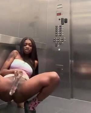 ebony elevator porn - Ebony teen gets caught flooding the elevator - ThisVid.com