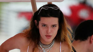 couples nude beach tampon - Bella Thorne Rocks Bikini and Hangs Out with Dog at the Beach