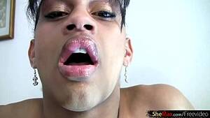 big lip dick sucking black tranny - Ebony T-girl with big lips gets her black cock jerked in POV - XVIDEOS.COM