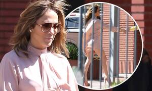 jennifer lopez celebrity upskirt - Jennifer Lopez exposes a lot of leg as she is hit by sudden gust of wind on  her way to a meeting | Daily Mail Online