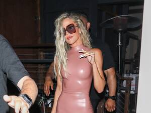 Khloe Kardashian Porn Captions - KhloÃ© Kardashian Borrows Kim's Latex Nude Dress for a Night Out