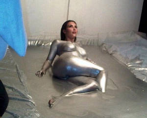 Celebrity Body Paint Porn - Kim Kardashian shares naked photo while covered in silver paint after she  complained it looked like porn.