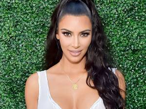 Kim Kardashian Lookalike Porn Caption - Kim Kardashian Poses Topless To Promote New Yeezy Trainers Because That  Makes Total Sense